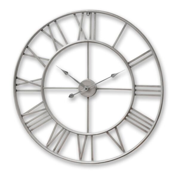 Make a bold statement in any room with the Large Silver Skeleton Wall Clock.  This striking timepiece is a masterful blend of contemporary design and industrial-inspired aesthetics