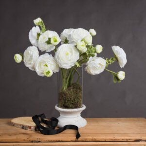 Unveil the epitome of floral sophistication with our White Ranunculus Spray. This premium artificial bloom brings the delicate charm of Ranunculus asiaticus to life