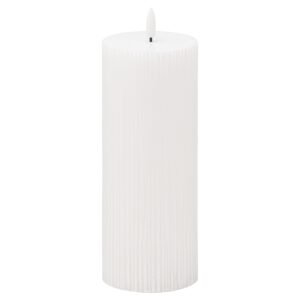 This real wax battery operated pillar candle is perfect for decorating your home or adding the finishing flourish to your wedding venue. The textured finish to this candle gives it an extra special element that will subtly layer additional texture into a space. Candles are the simplest way to create a warm atmosphere. The amber LED flame flickers gently to imitate the effect of a real flame but without the messy wax