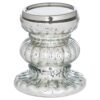 This Mercury Effect Bonbon Medium Candle Holder showcases a stunning fusion of artistry and function. Its textured glass body