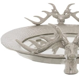 crowned with beautifully detailed silver stag head handles. The textured rim and pristine mirrored surface create an eye-catching interplay of light and reflection. A versatile piece that resonates in both traditional manor house settings and contemporary homes.  Perfect for styling coffee tables