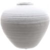 A pristine ceramic vase that embodies modern minimalism through its pure matt white finish and sculptural silhouette. The vessel's clean lines and organic curves create visual intrigue from every angle