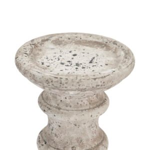 this column candle holder merges decorative flair with functional design. Its neutral palette and minimalist form create a refined atmosphere in any setting. The textural finish catches light beautifully