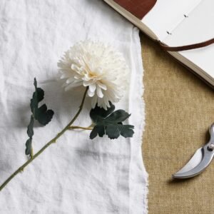 this pristine white chrysanthemum stem exemplifies absolute realism in artificial botanicals. The delicate petals unfold with astonishing authenticity