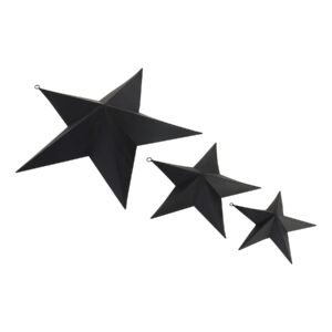 contemporary black metal star for wall mounting. Part of a set of three in alternative sizes