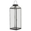 Modern design meets ambient functionality in this striking black metal lantern