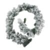 Introduce your customers to the magic of winter with our exquisite Snowy Pine Garland. This circular wreath boasts a remarkably lifelike frosted finish