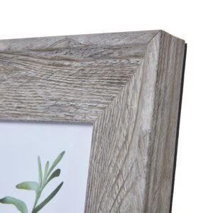 boasting a beautifully weathered finish that adds character to any space. The frame's subtle grey tones and distressed texture create a timeless look