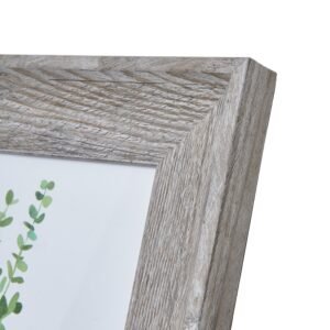 boasting a beautifully weathered finish that adds character to any space. The frame's subtle grey tones and distressed texture create a timeless look