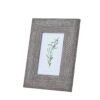 Elevate your home decor offerings with our exquisite Woven Photo Frame. This 4x6 frame showcases a beautifully textured