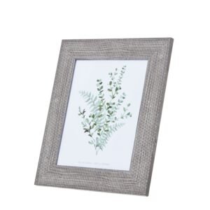 Elevate your home decor offerings with our exquisite Woven Photo Frame. This 8x10 frame showcases a beautifully textured