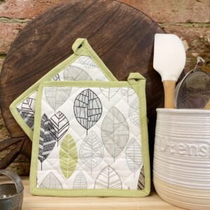 Two Fabric Pot or Pan Mats With Contemporary Green Leaf Print Design