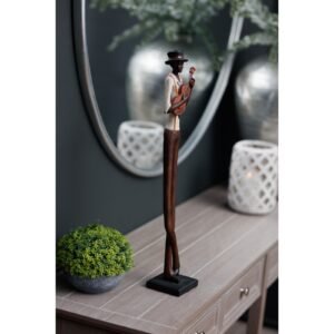 this striking jazz musician sculpture brings artistic flair to any interior space. The elongated silhouette stands at attention